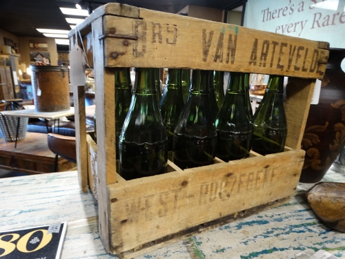 Green Glass Bottles in Wooden Crate B Denver Furniture Store