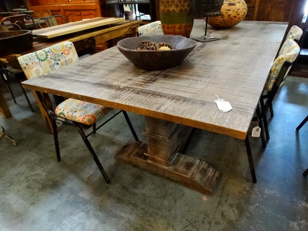 Modern Rustic Dining Table This table has a brown finish.