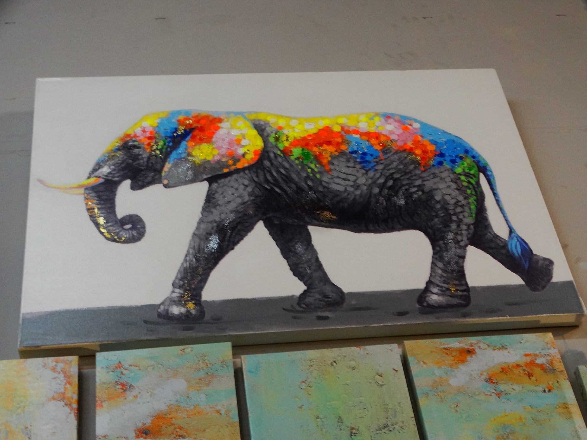 Elephant Wall Art This Wall Art Painting Of A Colorful Elephant Is Sweet The Grey Hues Contrasted By All The Color Gives It Artsy Appeal A Perfect Piece For The Elephant Lover