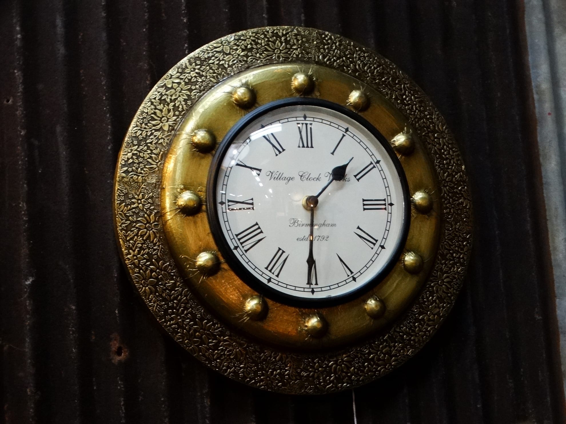 Round Wall Clock Features A Traditional, Small Round Wall Clock
