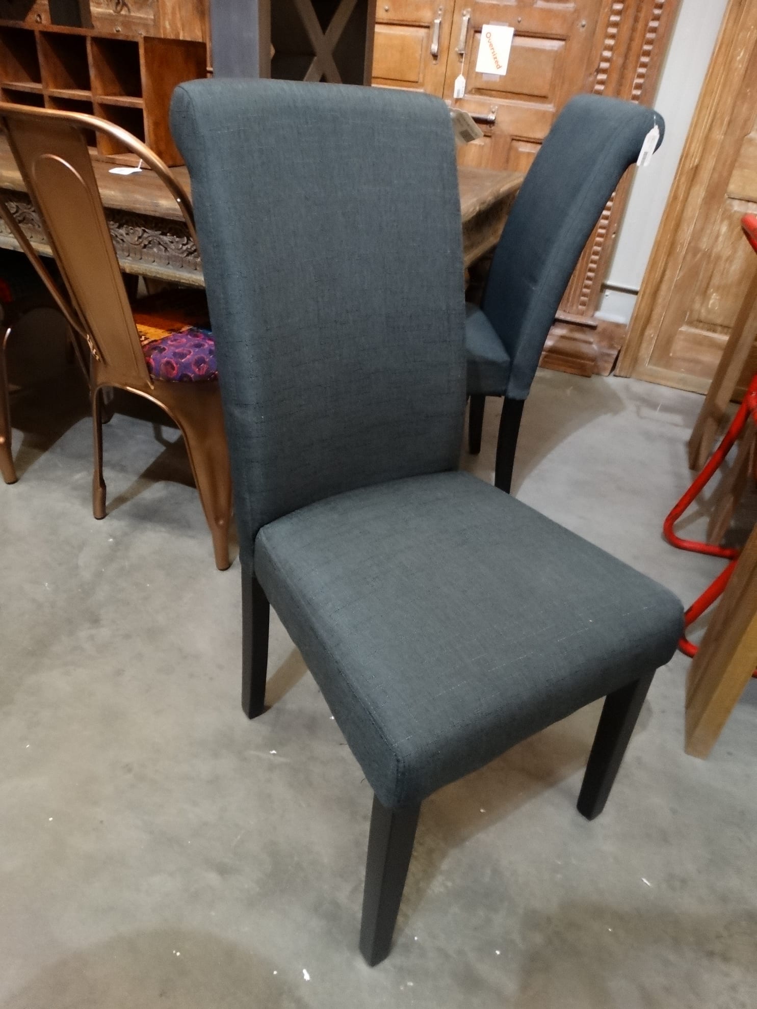 Upholstered Dining Chair adds a textile element to your space.