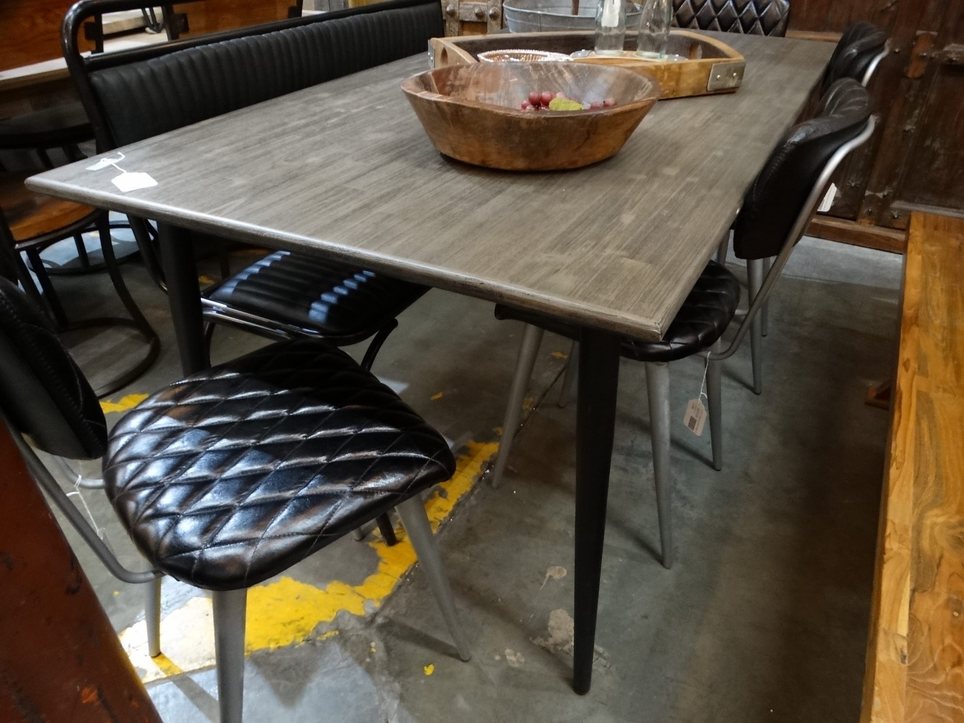 Wooden Dining Table Has A Textured Gray, Light Wooden Dining Table With Black Legs