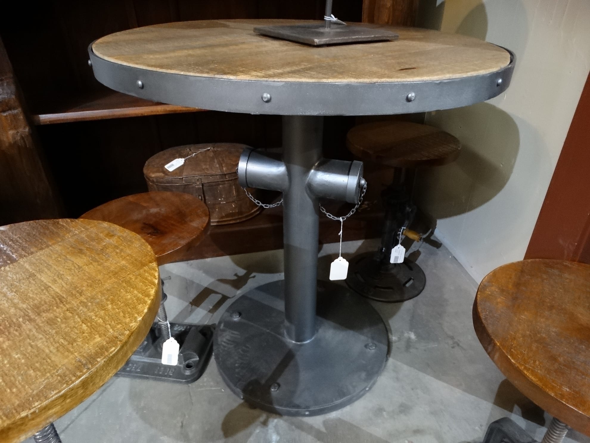 Metal Dining Table Features A Natural, Industrial Round Table