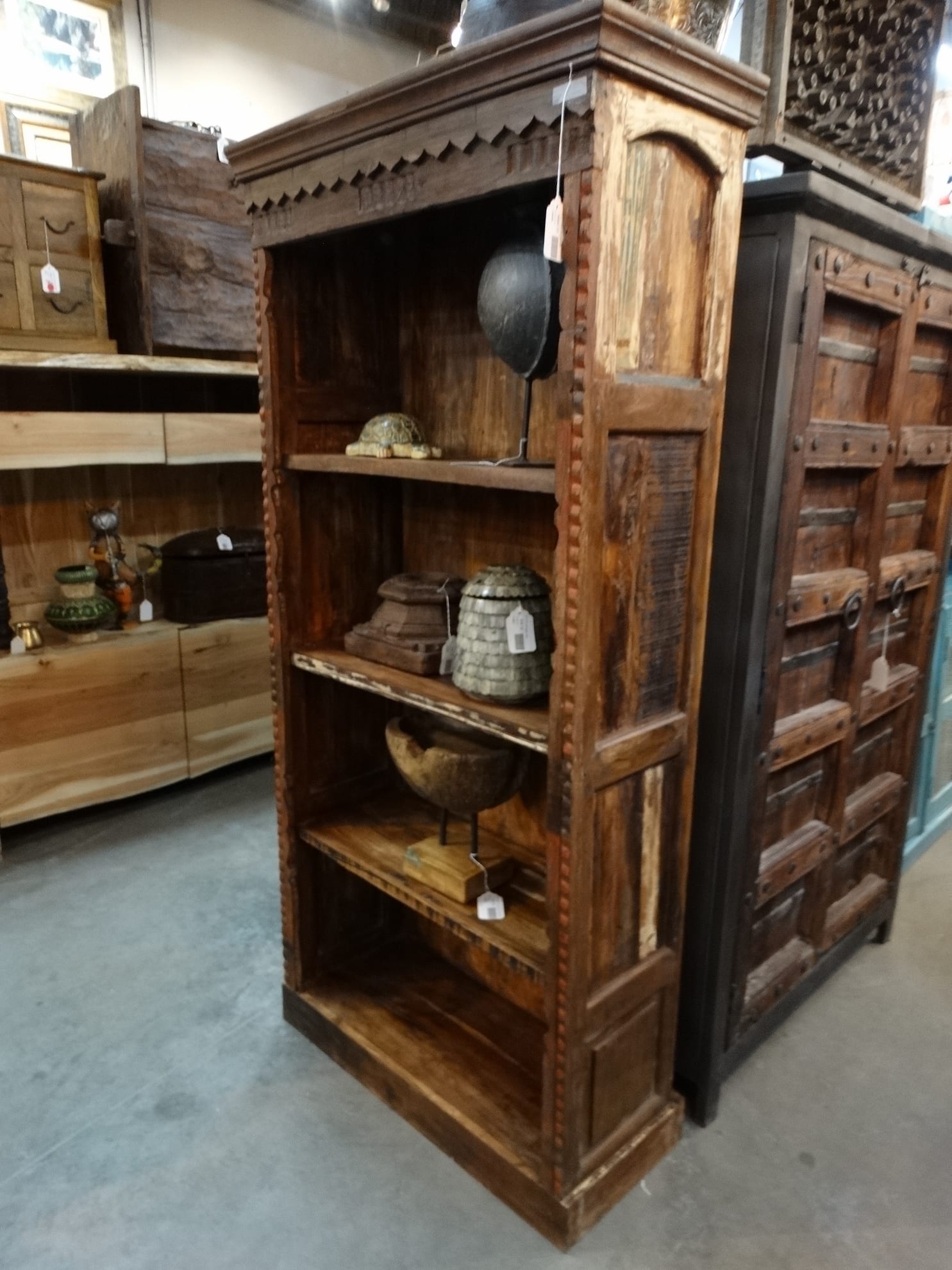 Wooden Bookshelf Features Repurposed Doors And Carved Trim