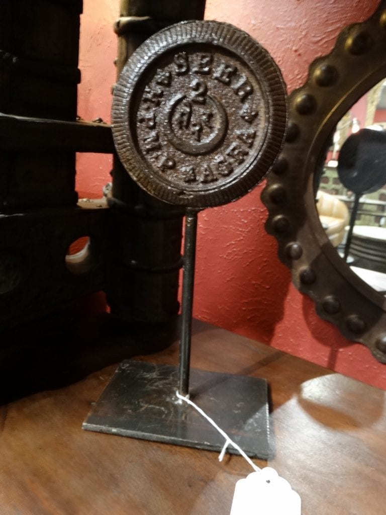 Cast Iron decorative accessory is heavy and pretty.