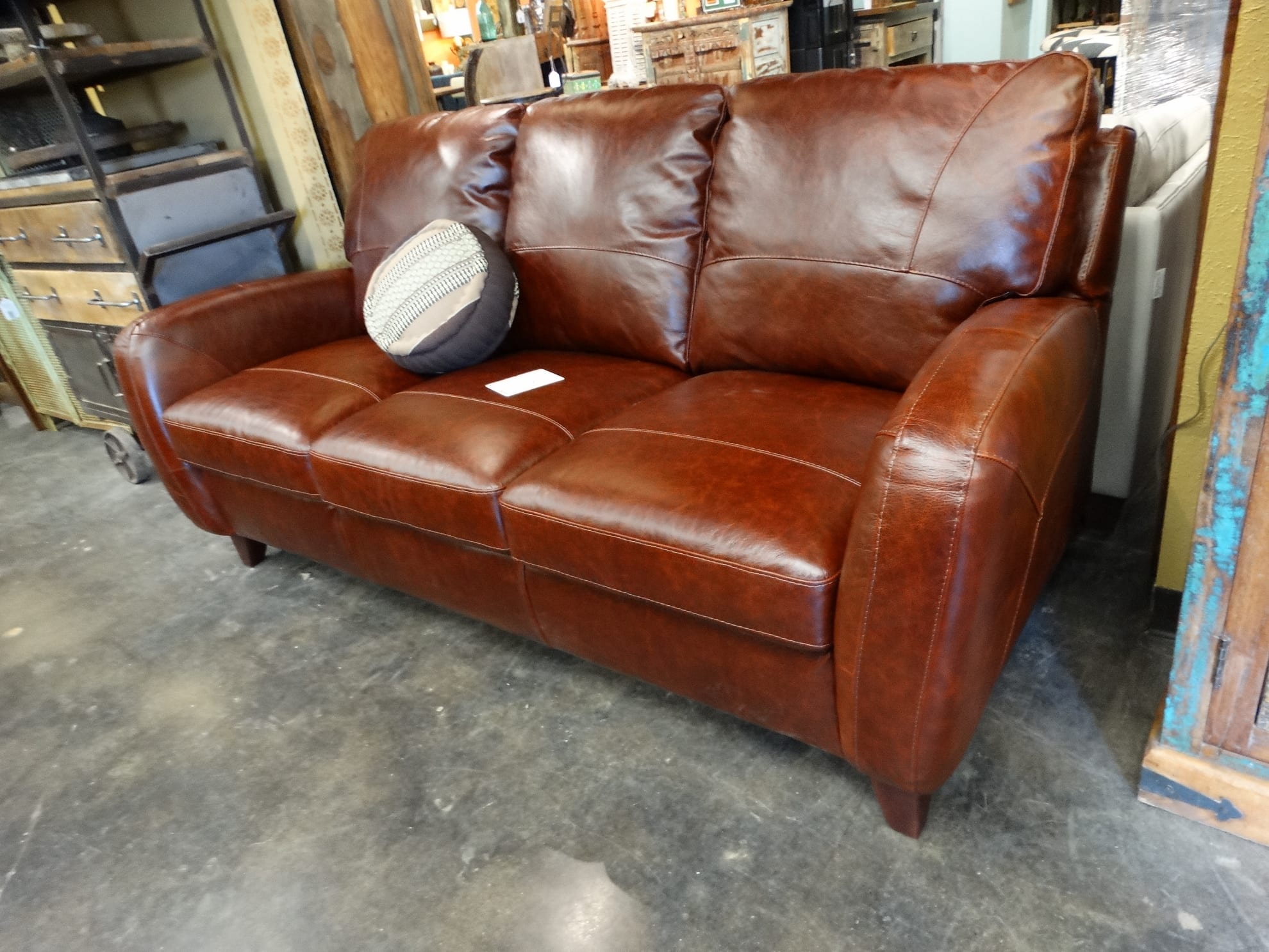 reddish brown leather sofa