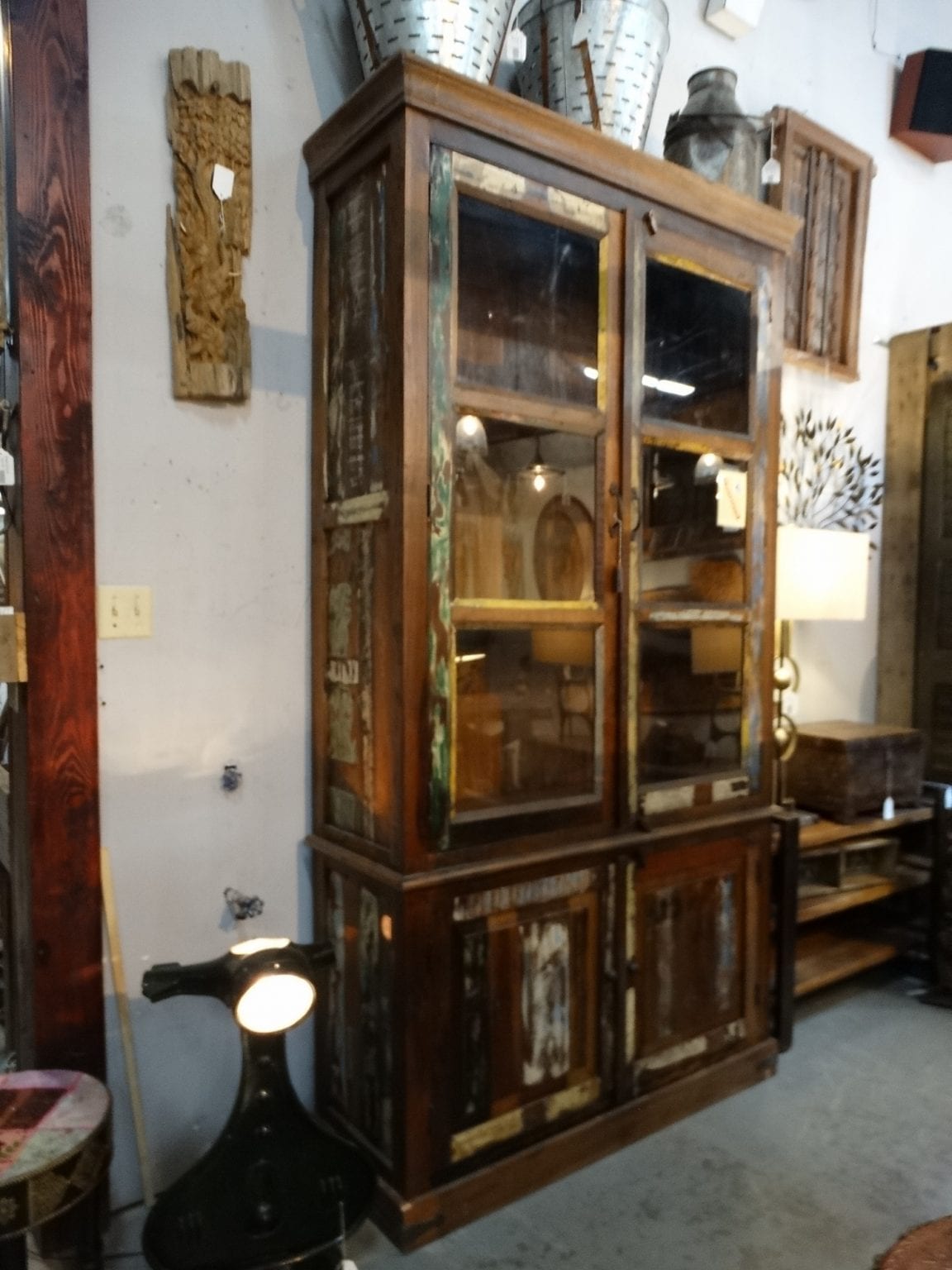 Wood Cabinet with Glass Doors has a traditional rustic flair.