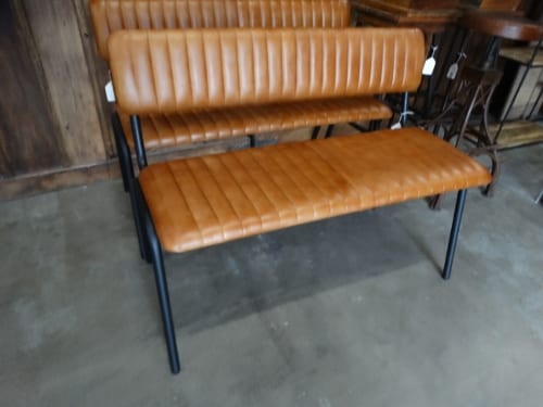 light brown leather ribbed bench with seat and back