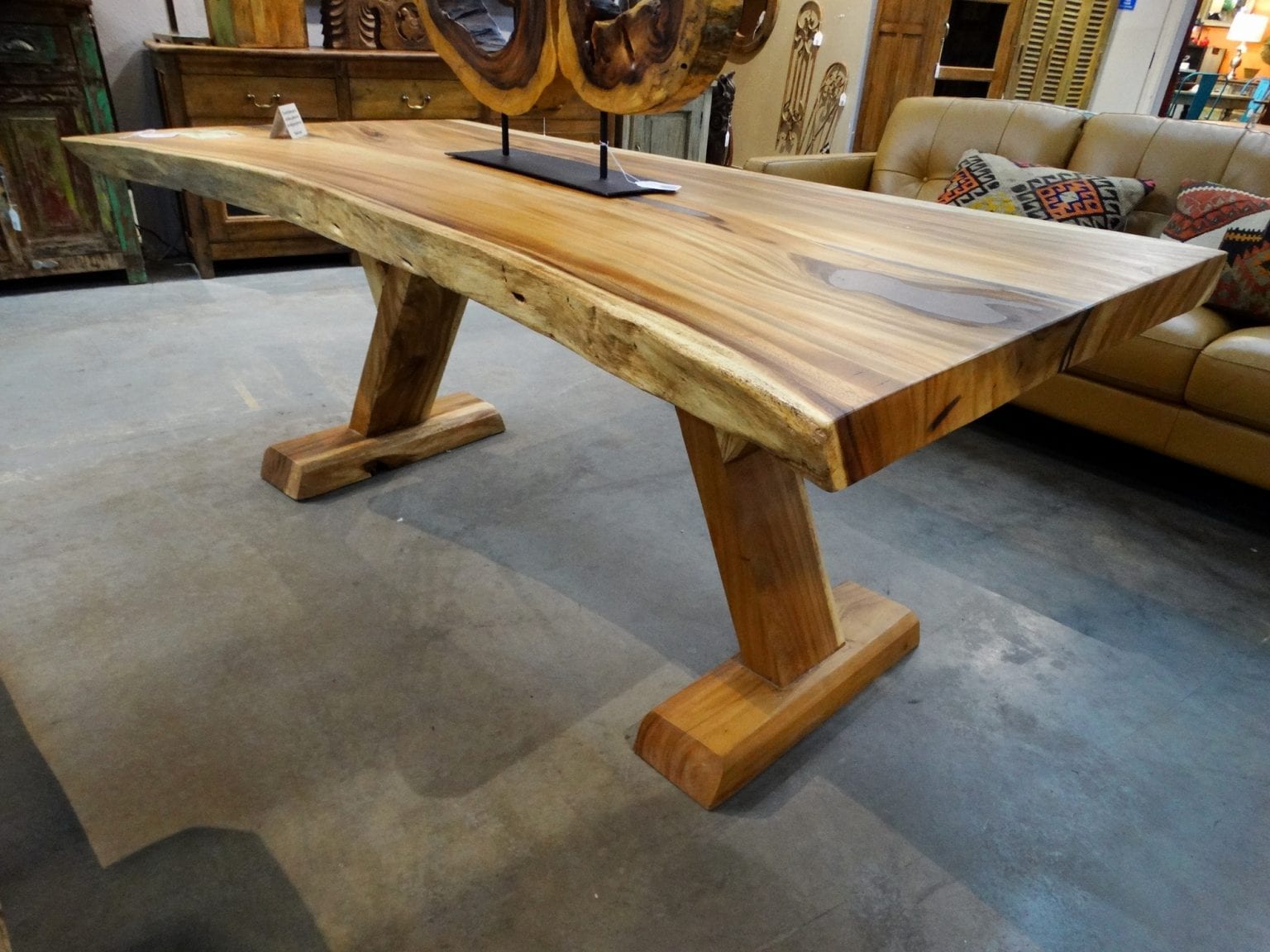 Wood Dining Table with Wood Legs features a rustic farmhouse look.
