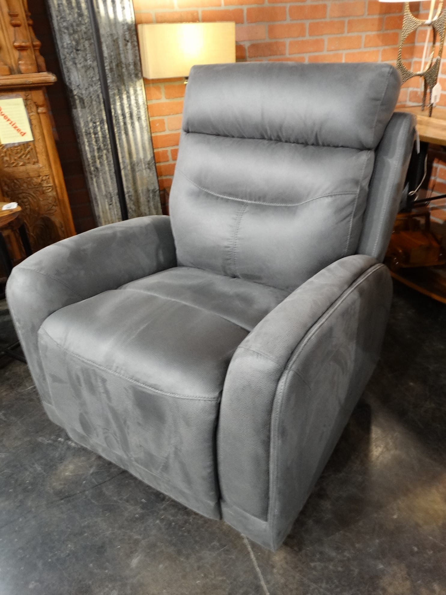 Comfy and Warm Recliner reclines with the push of a button.