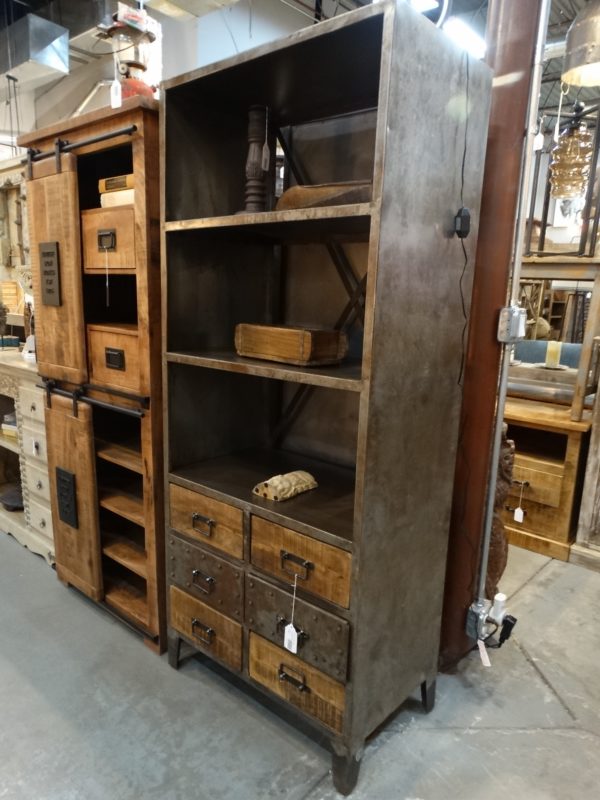 large metal shelf with drawers