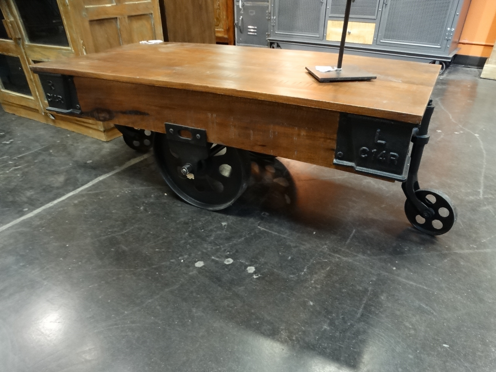 Factory cart coffee table features an industrial vibe.
