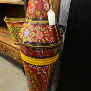 tall painted metal vase